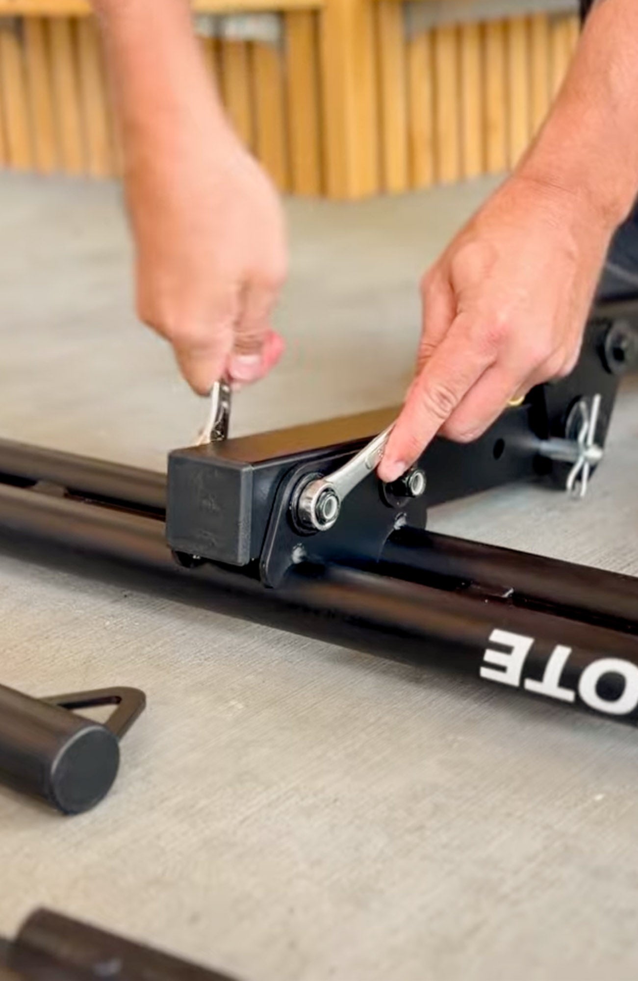 MotoTote MTM platform being installed on a MotoTote Mini electric bike carrier, showcasing the modular and serviceable main platform designed for long-term durability and replacement.