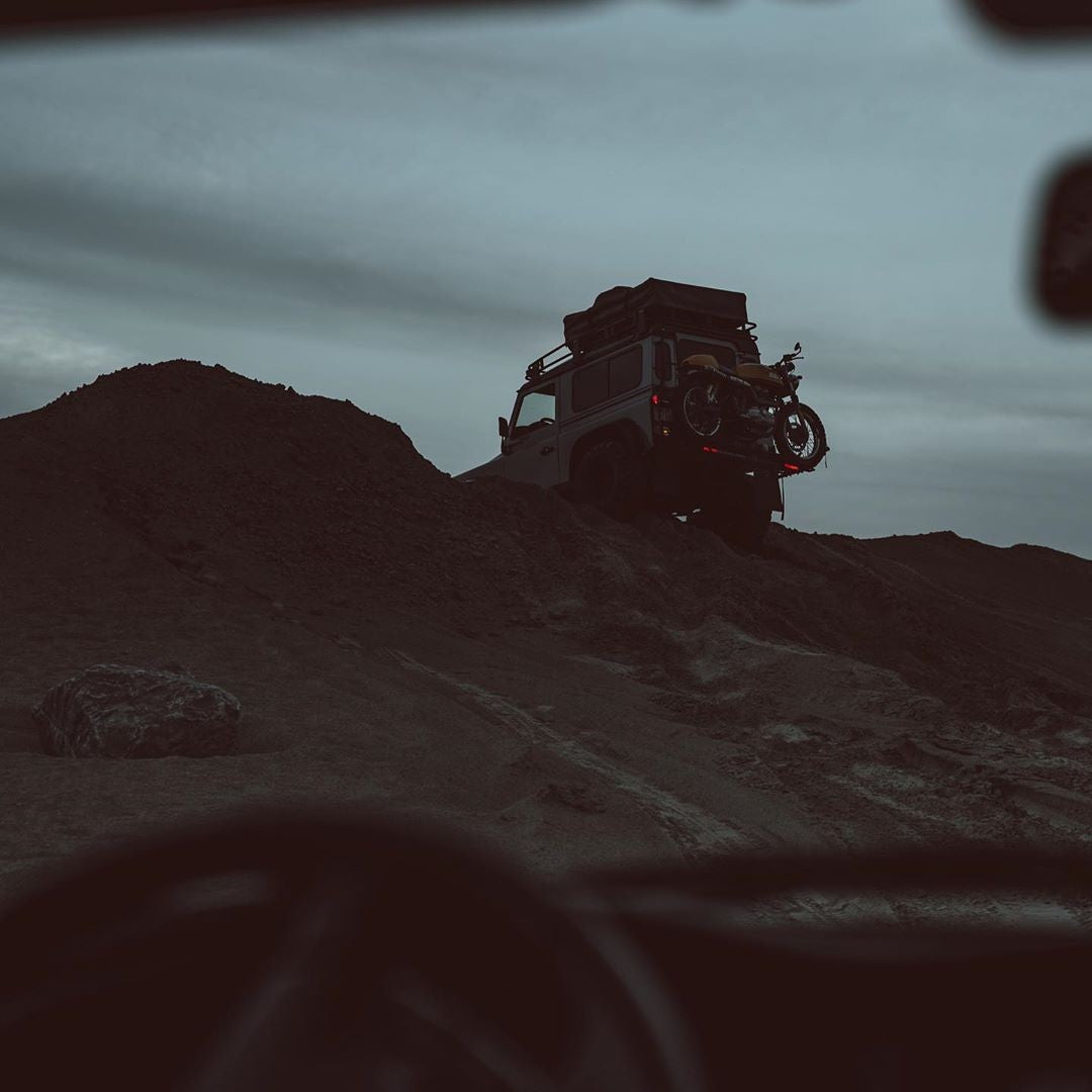 Triumph Motorcycle Rack on Land Rover Defender through Sand Dunes