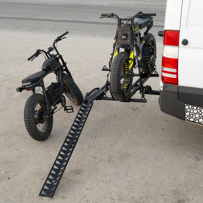 Super73 electric bikes mounted on a MotoTote Mini Dual electric bike carrier with loading ramp attached to a Mercedes Sprinter van, showcasing secure transport for heavy e-bikes and adventure travel.